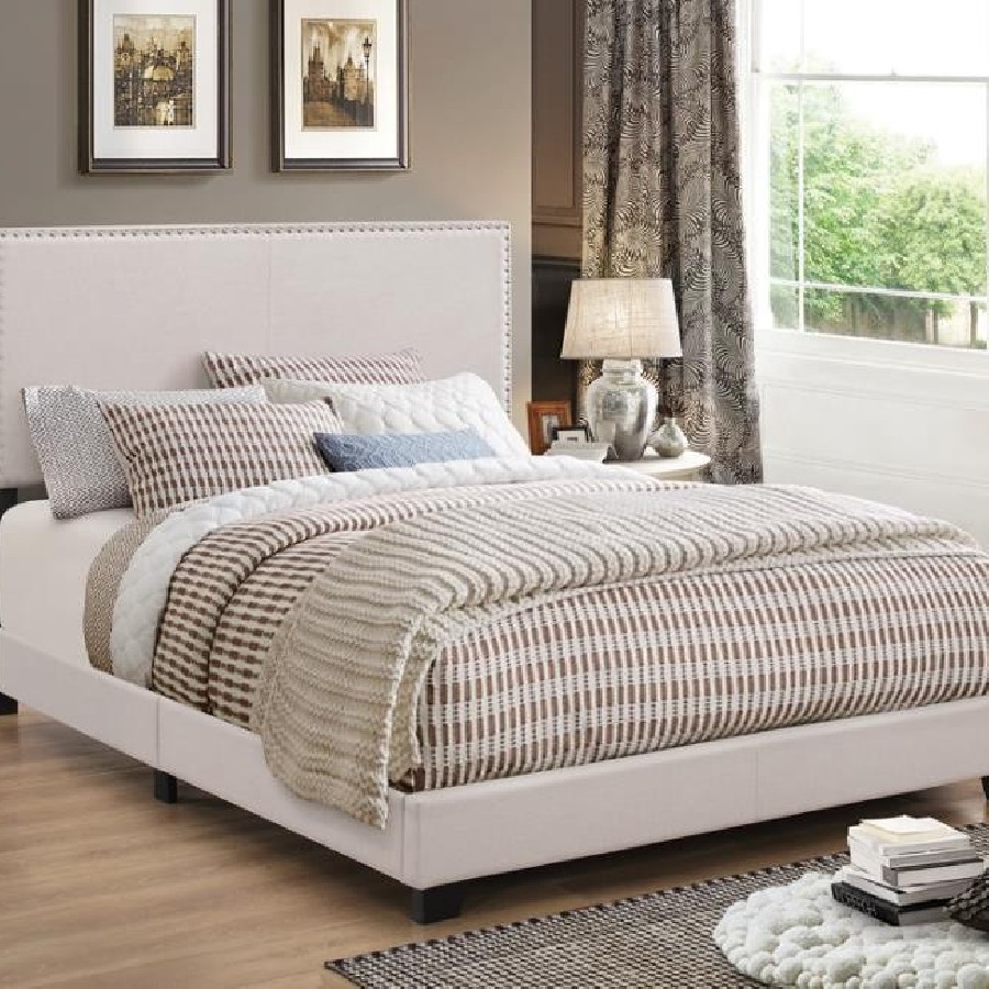 Boyd Eastern King Upholstered Bed with Nailhead Trim Ivory